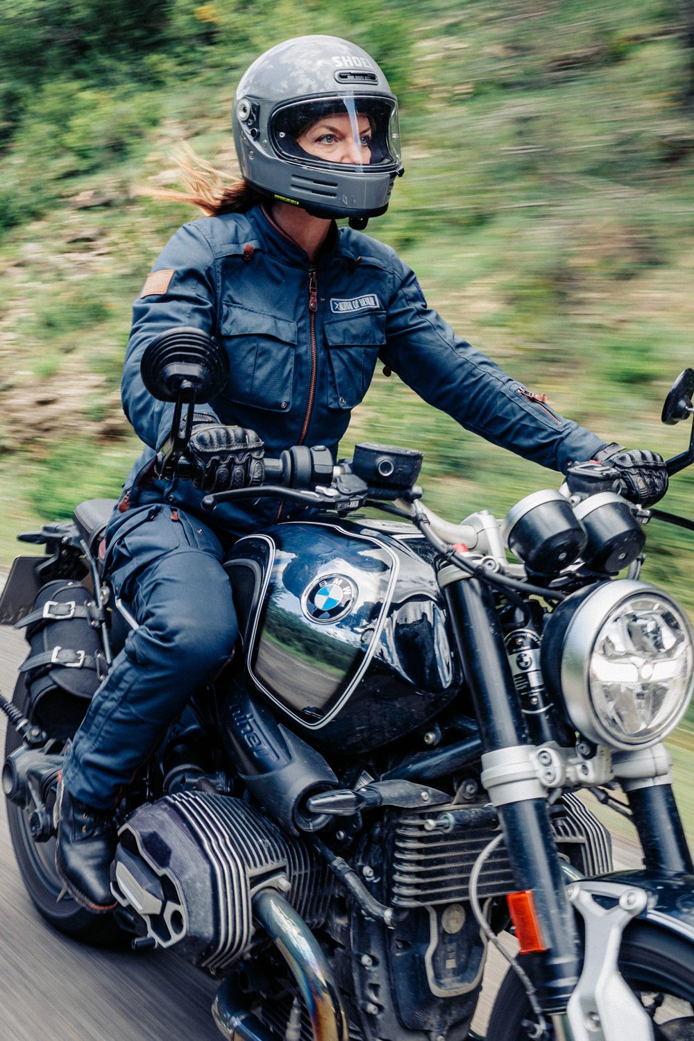 A Motorcycle Rider wearing North of Berlin, Dryzone Suit